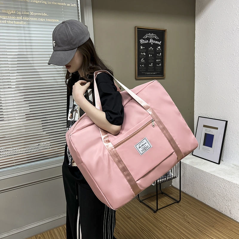 Purple travel bag with extended shoulder strap