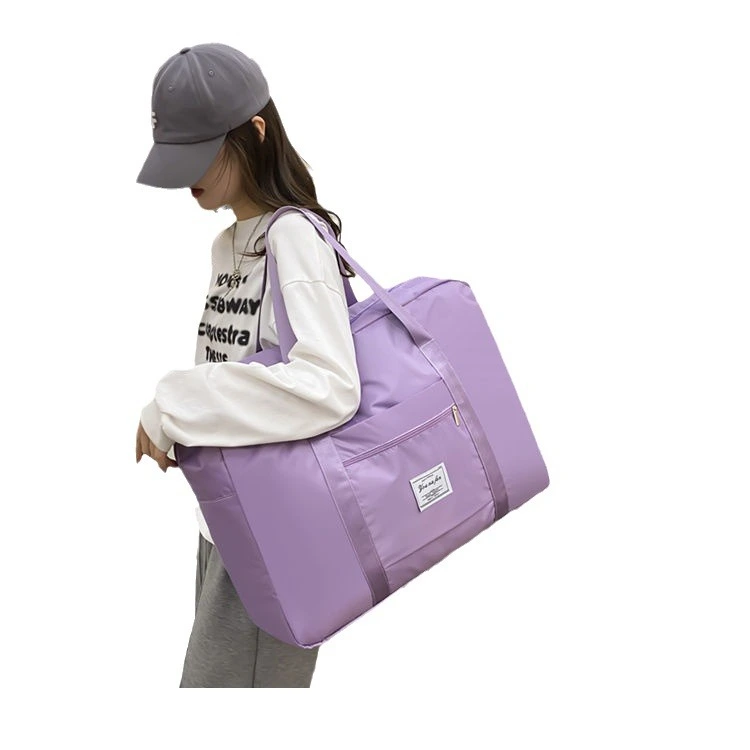 Pink Oxford travel bag demonstrating water-resistant material