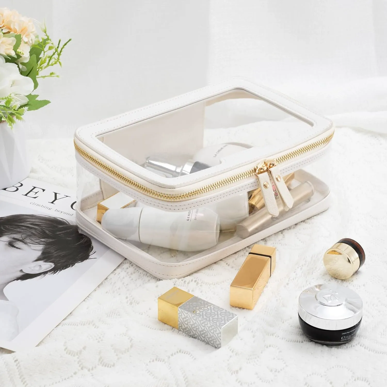 Custom clear TPU cosmetic bag with luxury gold zipper - transparent makeup pouch front view