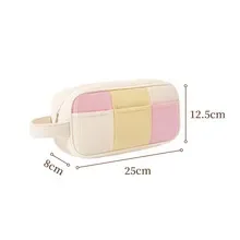 Open colorblock canvas pouch showing interior