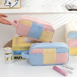 Colorblock zip cosmetic bag on a storage shelf