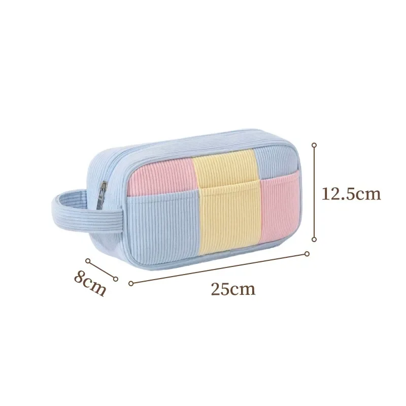 Colorblock canvas cosmetic bag with blue, yellow and pink panels