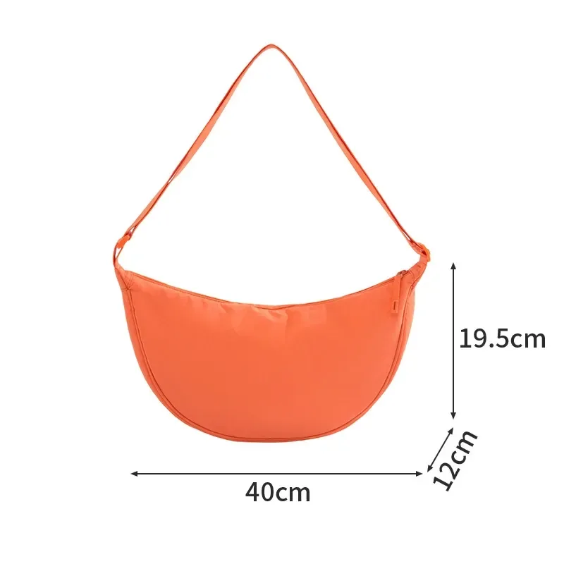 Moon-shaped crossbody bag with adjustable strap