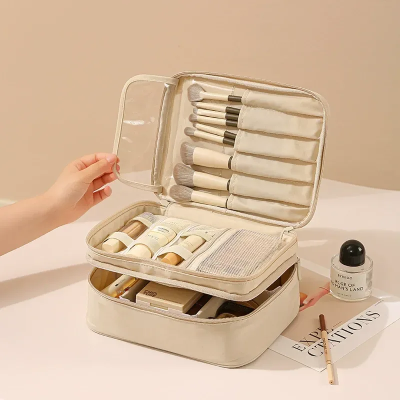 Hand carrying the double-layer makeup organizer