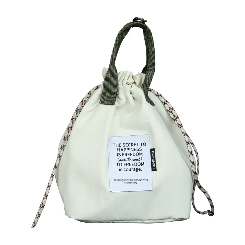 Custom insulated drawstring lunch bag in cream for commuting and school