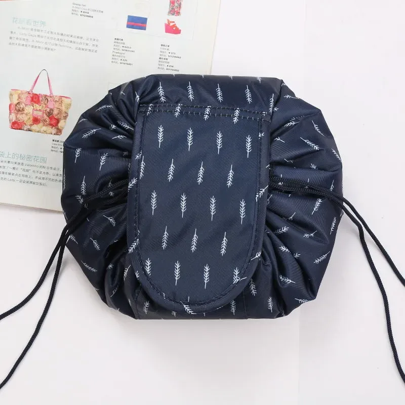 Drawstring cosmetic pouch showing embroidered patch and stripe fabric
