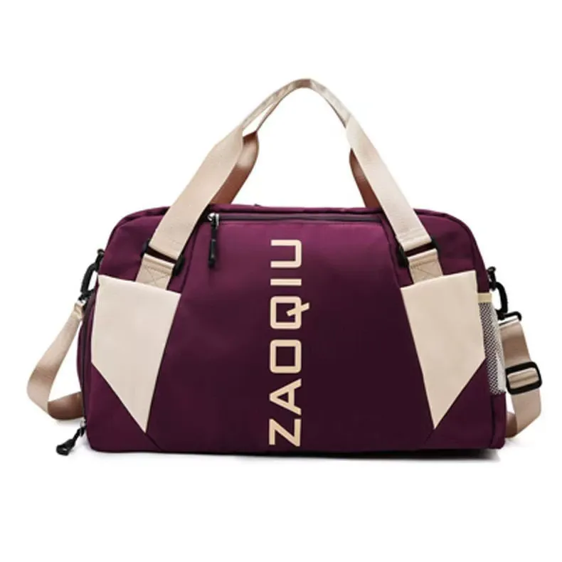 Wine red gym duffel showing oxford fabric and zipper details