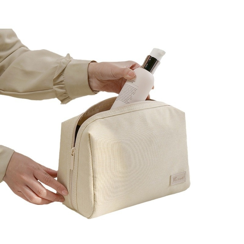 Water-resistant RPET toiletry bag showing material texture