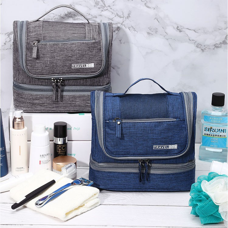 Interior view showing elastic straps holding travel bottles upright and mesh pockets for organization