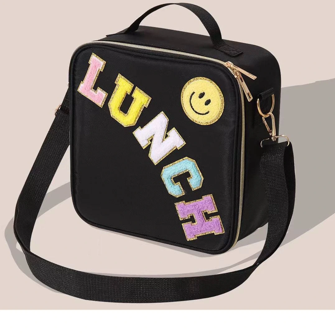 Interior capacity demonstration with bento box and water bottle placement