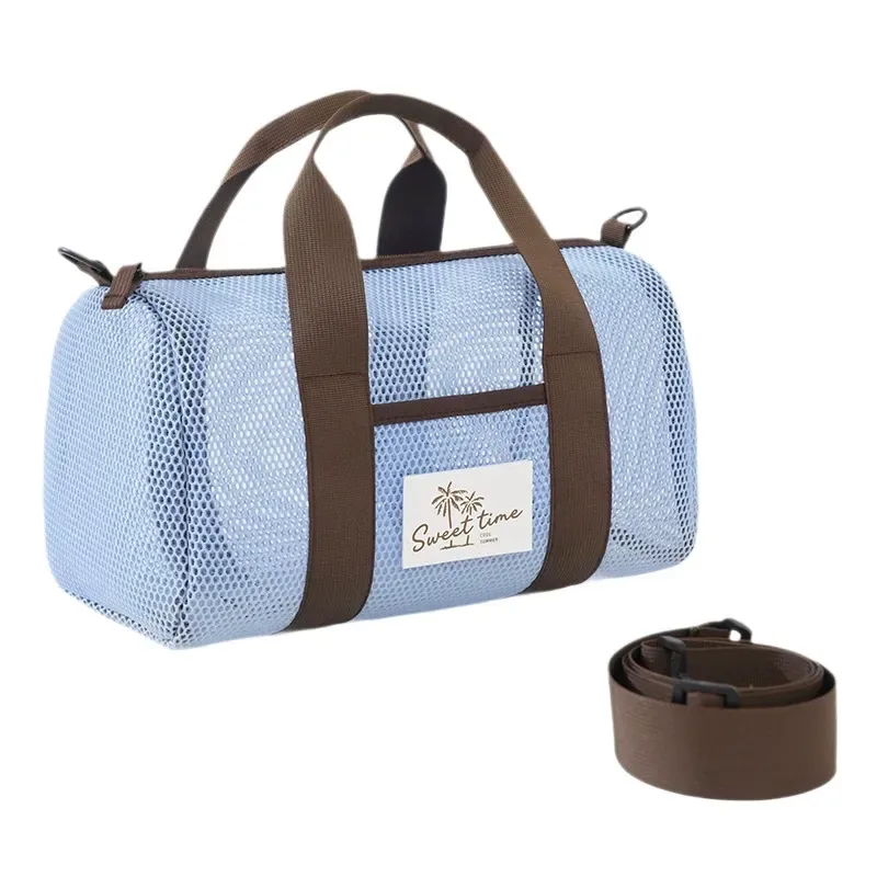 Light blue mesh beach duffel tote with tan webbing handles and shoulder strap