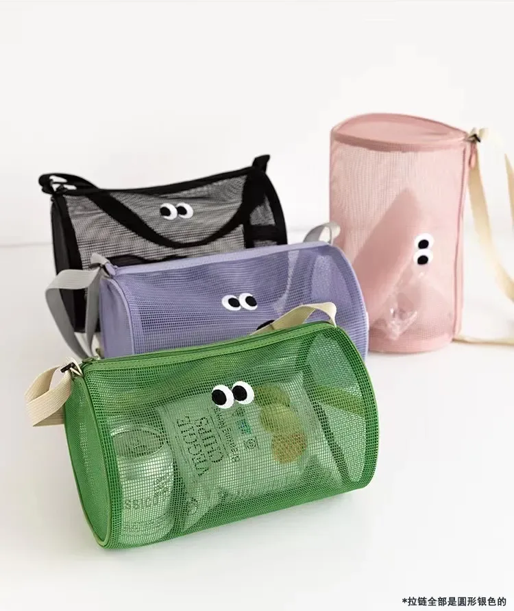 Cylinder mesh duffel with shoulder strap