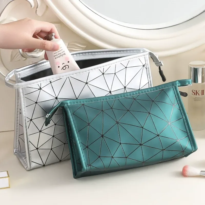 Silver-white quilted PU cosmetic bag with geometric diamond pattern, open top