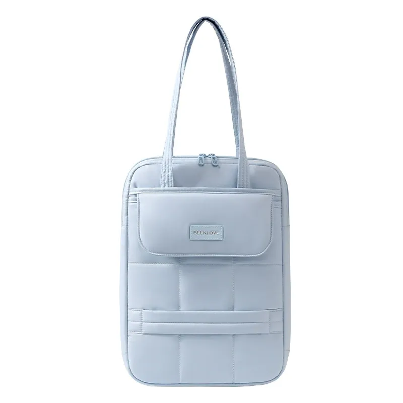 Single shoulder laptop bag in blue-grey with laptop inside