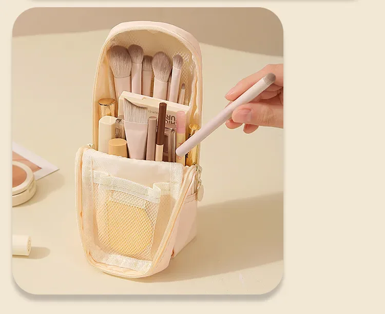 Open brush organizer showing mesh divider slots and brush placement