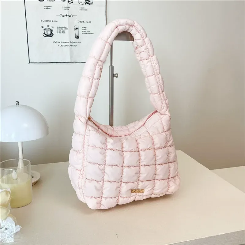 Quilted cloud underarm bag in cream