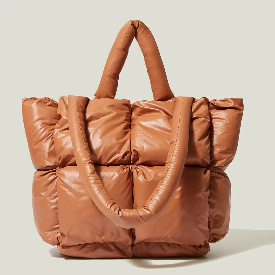 Brown quilted puffer tote showing soft quilt stitch pattern
