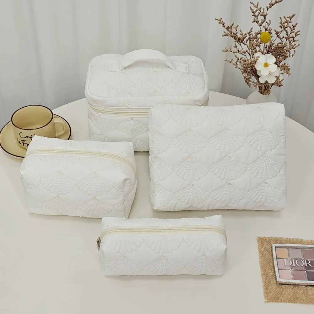 White quilted cosmetic bag styled for a clean beauty look