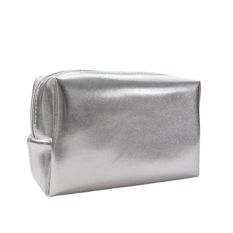 Silver PU cosmetic bag set showing zippers and metallic finish