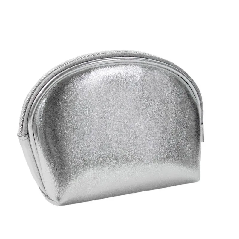 Silver PU cosmetic bag trio styled on a white background