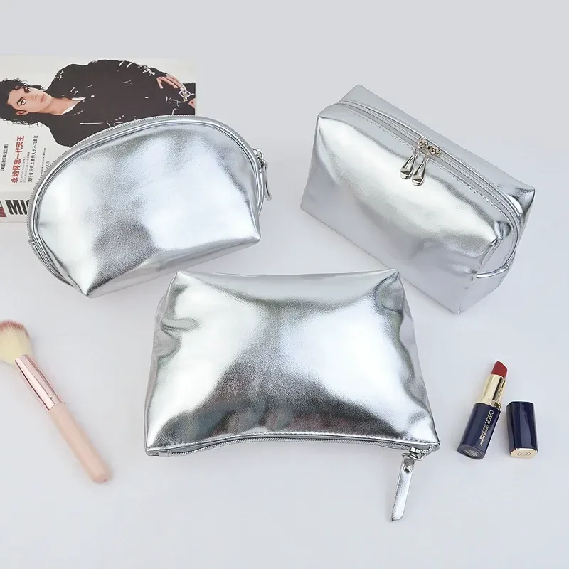 Three-piece silver cosmetic bag set with metal pulls