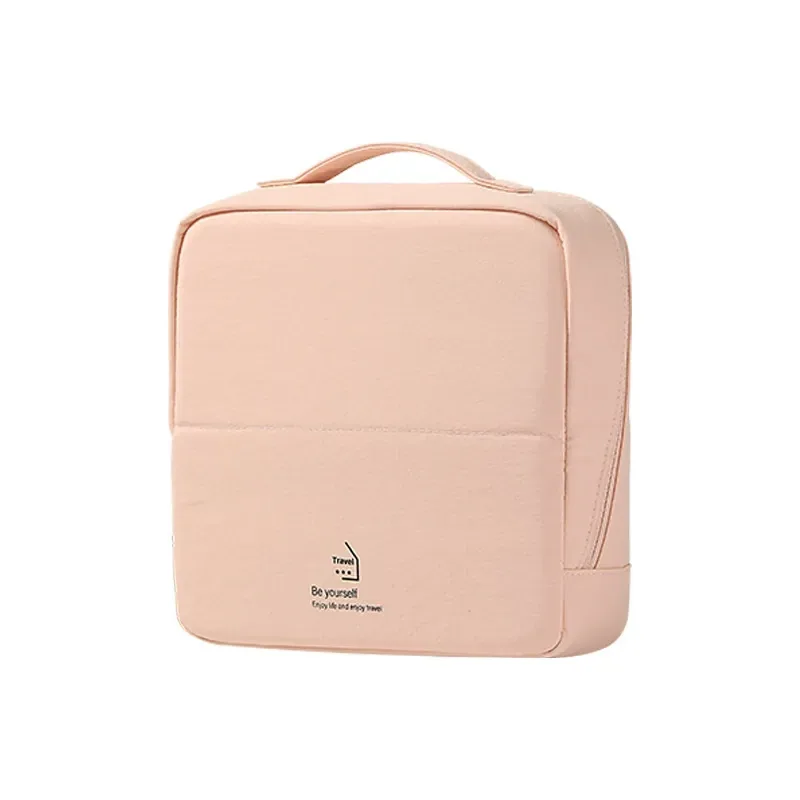 Compact standing brush pouch in neutral fabric tones