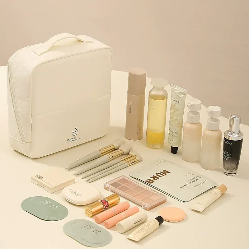 Organized makeup brushes in a standing storage bag