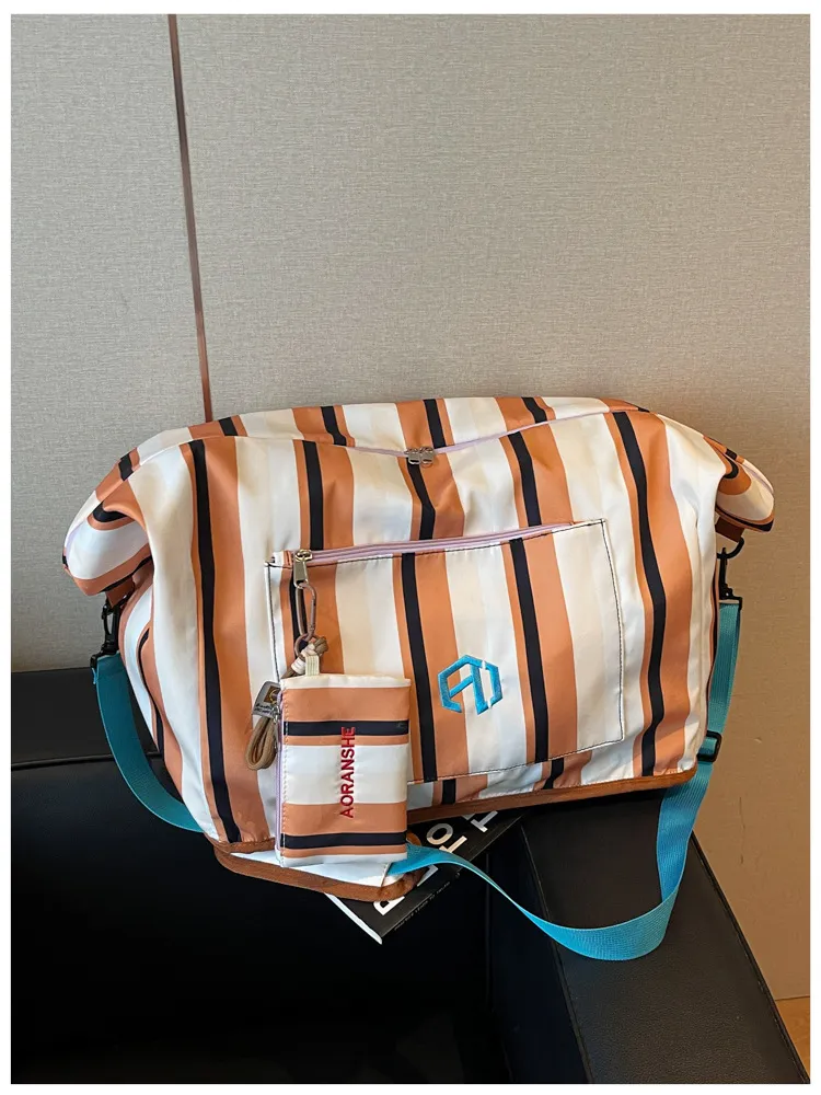 Orange and white striped duffel showing breathable fabric