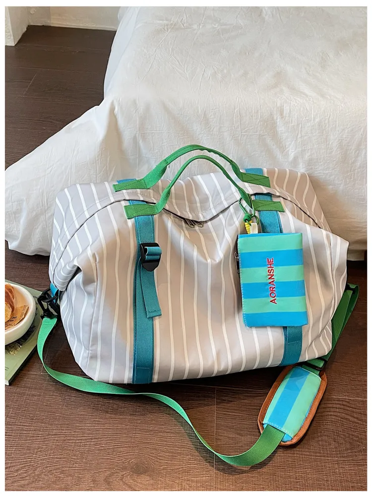Black polka dot white version of the swim gym duffel