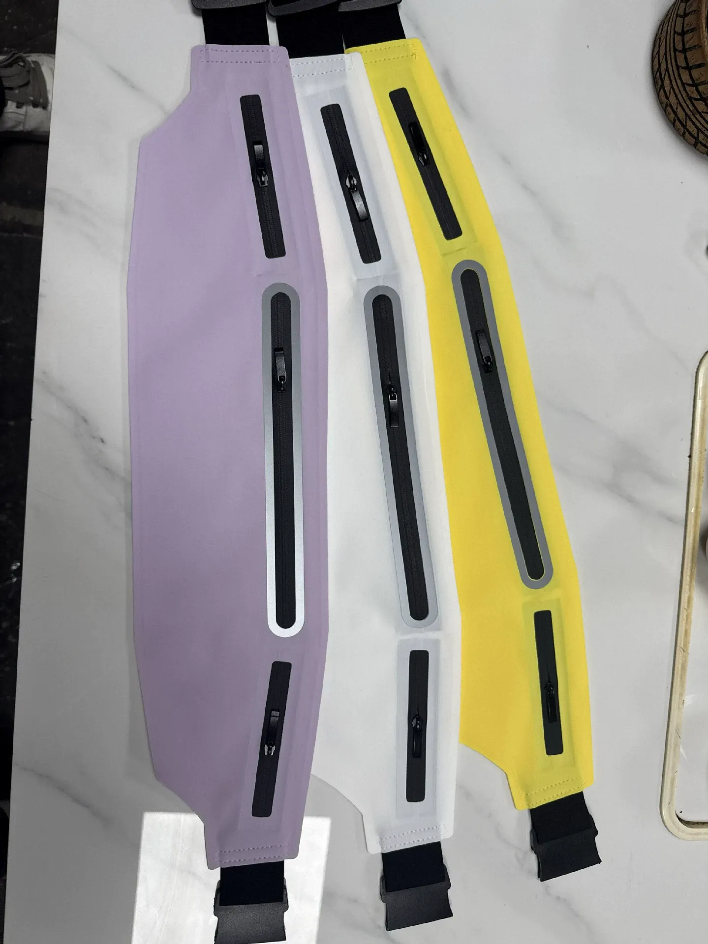Black ultra-slim running waist bag product shot