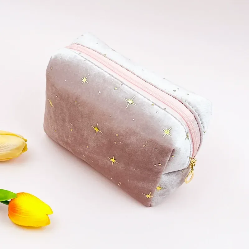 Octagon velvet cosmetic bag in pink with gold hardware