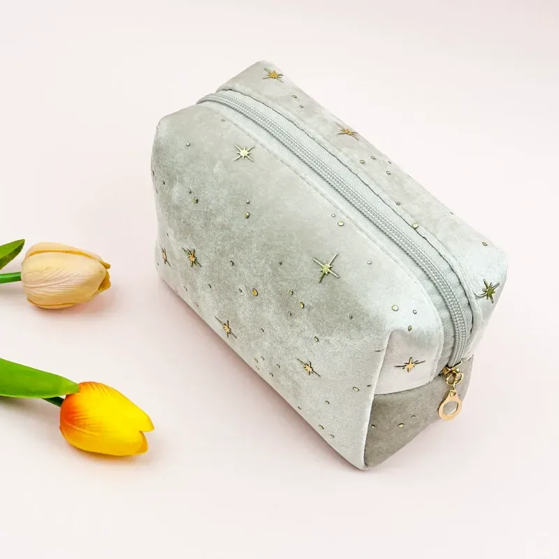 Velvet octagon bag styled as a giftable cosmetic pouch