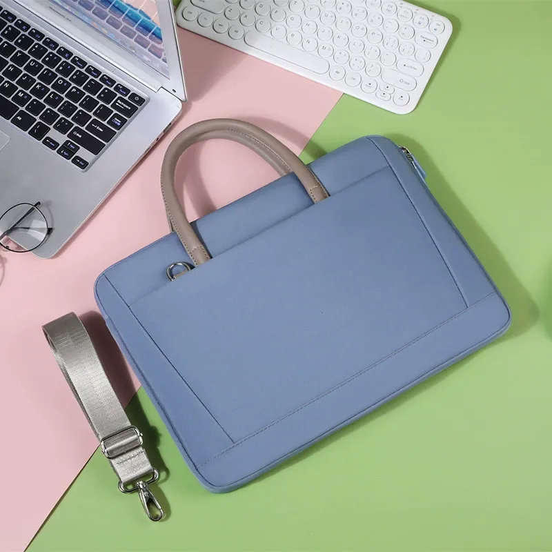 Waterproof women's laptop commuter briefcase bag in light blue with detachable shoulder strap