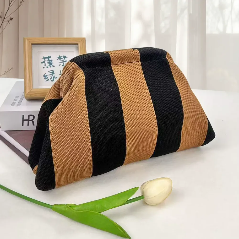 Woven striped tote styled as a casual carry pouch
