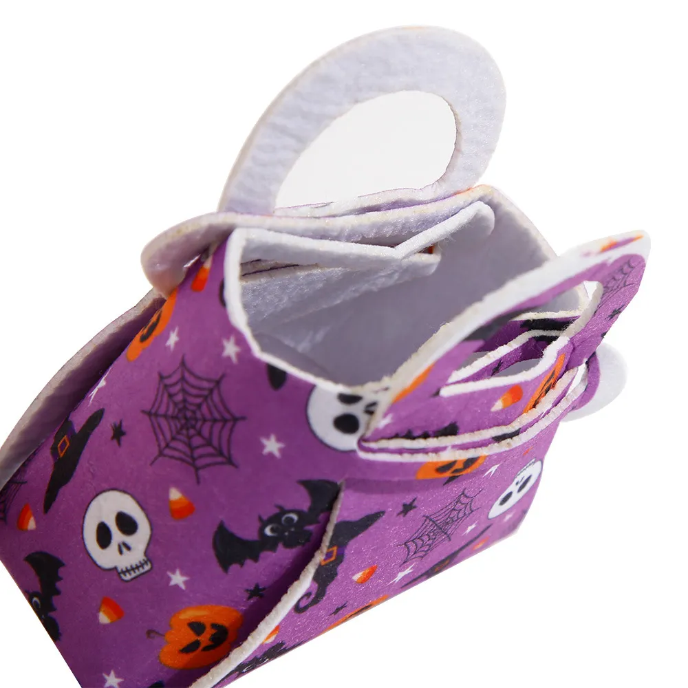 Small purple felt Halloween candy bag with white handle