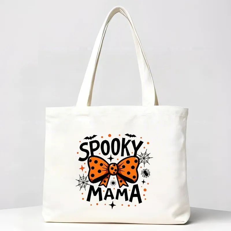 Natural canvas tote with full-color Halloween print and polka-dot bow design