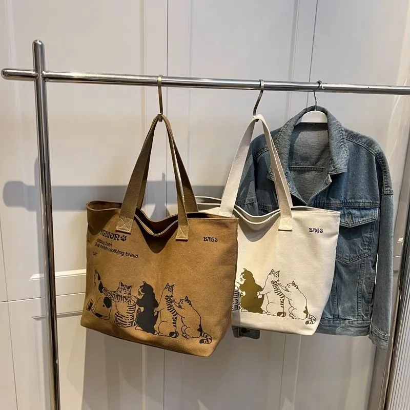 Japanese canvas tote styled with minimalist outfit, cat print detail