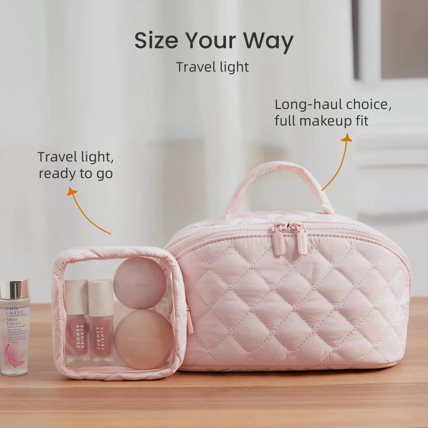 Blush pink vanity case with metal logo plate for skincare brand packaging