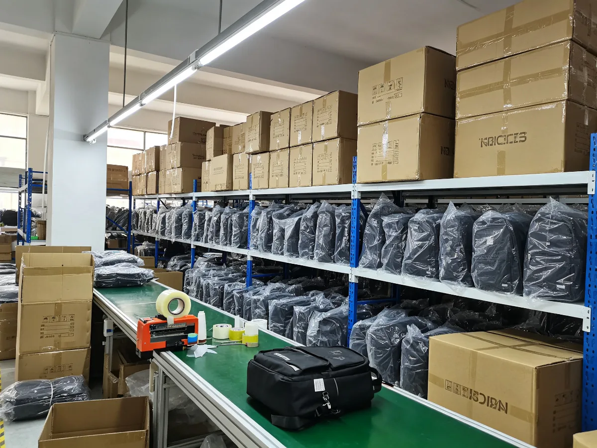 Packed custom bags and cartons ready for shipment in the Merris factory warehouse