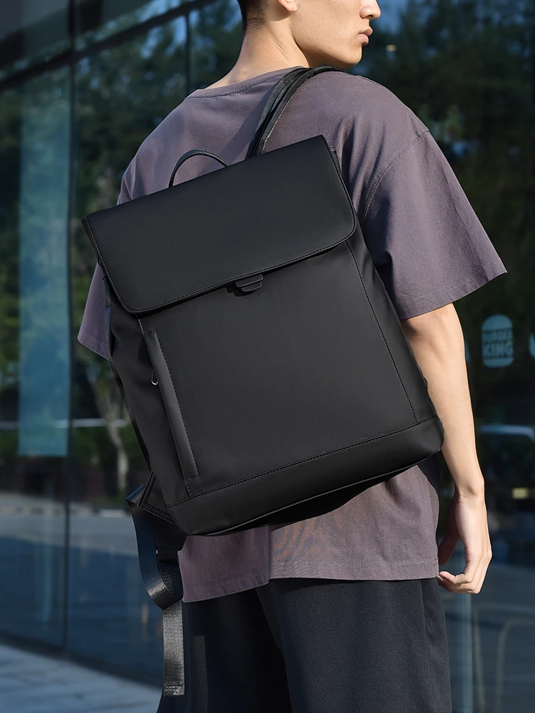 Back view demonstrating 15-inch laptop fit for commuting.