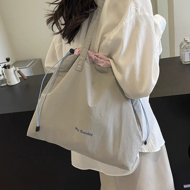 Grey and khaki color options of nylon student tote bags