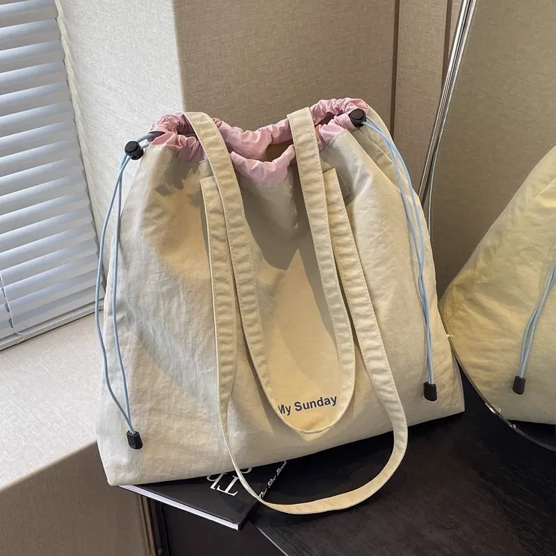 YKK zipper closure and interior phone pocket detail