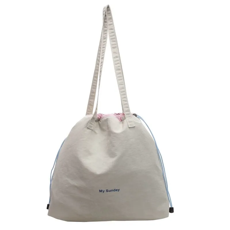 Lightweight nylon student tote bag in grey with zip closure