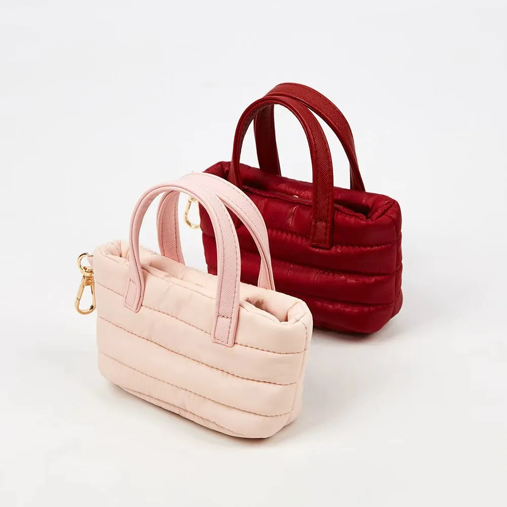 Custom quilted mini nylon bag with gold hook clip in blush pink and wine red, fits earbuds lipstick keys and coins