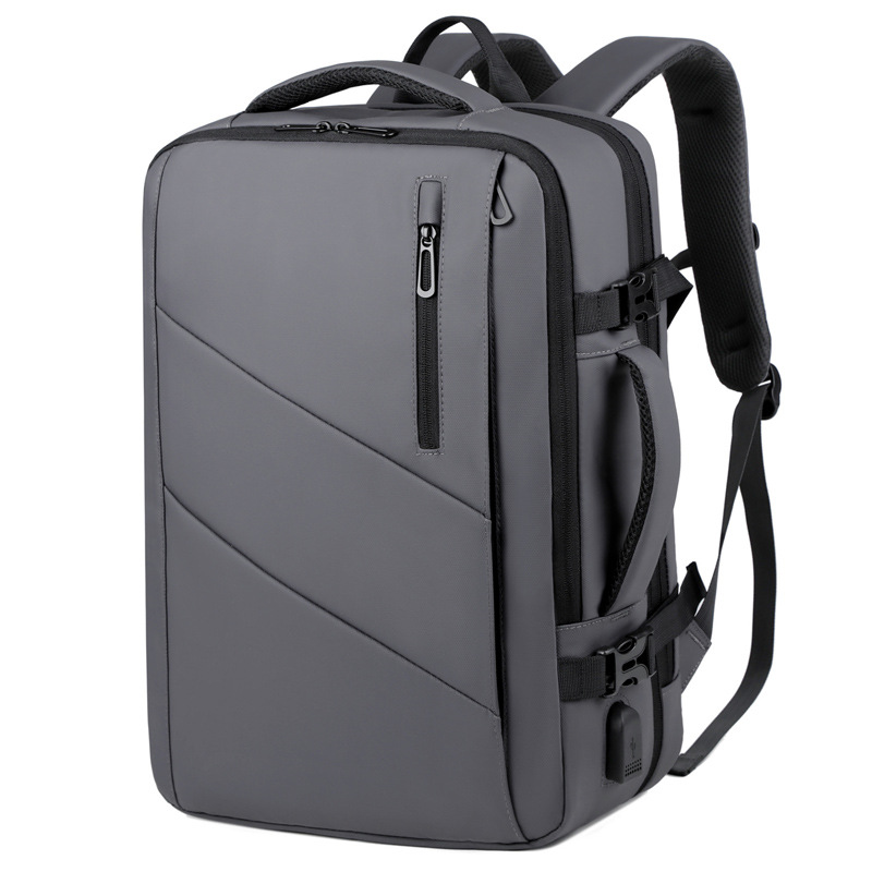 Grey water-resistant coated polyester travel backpack with ergonomic straps.